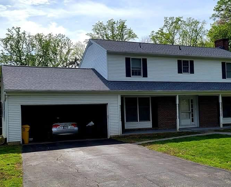 Toro Contracting LLC siding and roofing installation on residential property