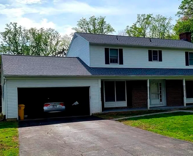 Toro Contracting LLC siding and roofing installation on residential property