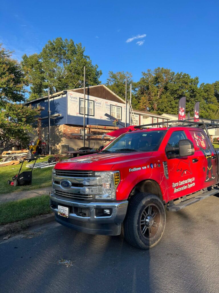 Toro Contracting truck providing roof restoration and storm damage repair services in Maryland.