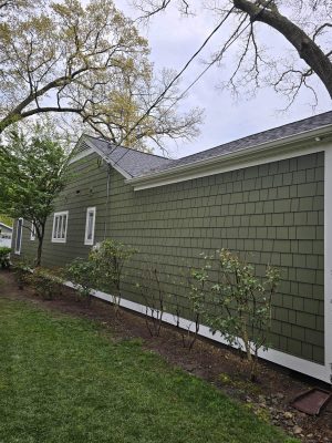 Expert siding and roof restoration project completed by Toro Contracting LLC, providing quality exterior repairs for Maryland homes.