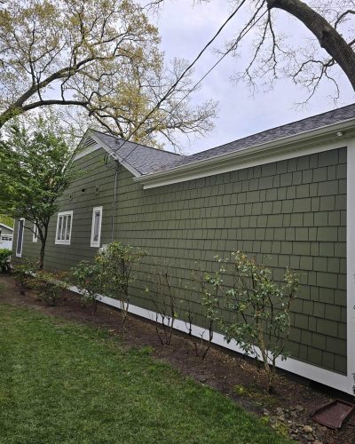 Expert siding and roof restoration project completed by Toro Contracting LLC, providing quality exterior repairs for Maryland homes.